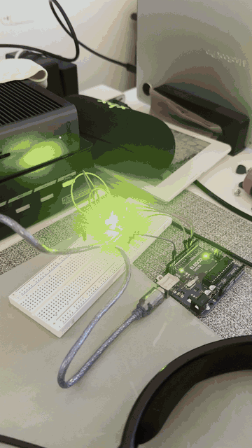 Actual recording of red, green, and blue LEDs blinking on the breadboard beside the USB-powered ELEGOO UNO R3.